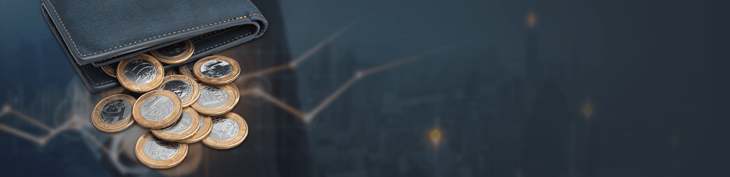 Coins spilling out of a leather wallet against a dark city skyline with a faint line graph